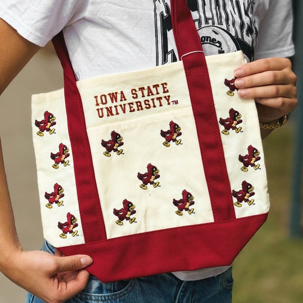 A Cyclone wearing Walking Cy Cardinal Embroidered Mini Boat Tote